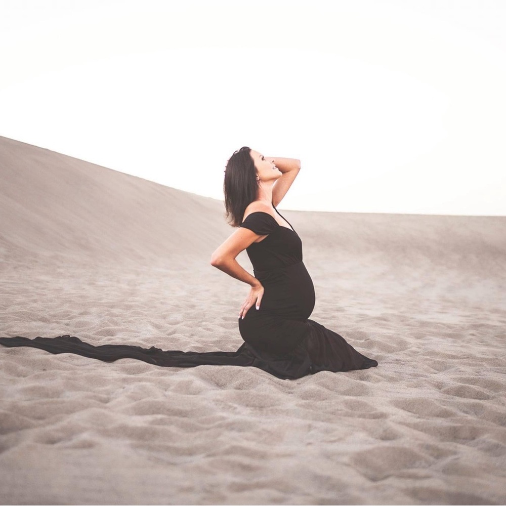 Elegant Black Maternity Gown with Off-Shoulder Detail